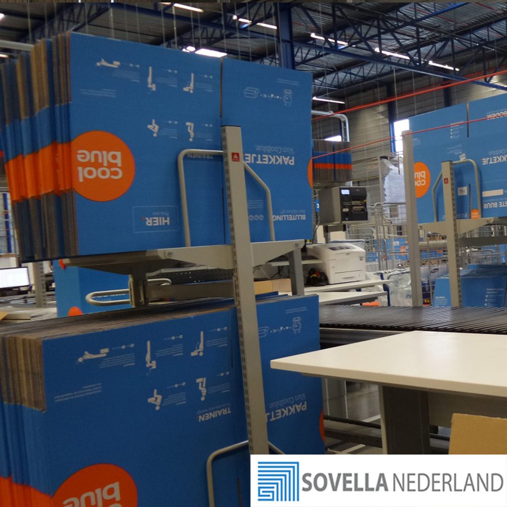 Sovella nederland kartontrolley tussen werktafels en inpaktafels